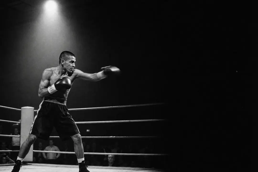 Boxing event photographed under arena lights for a Singapore live-event story